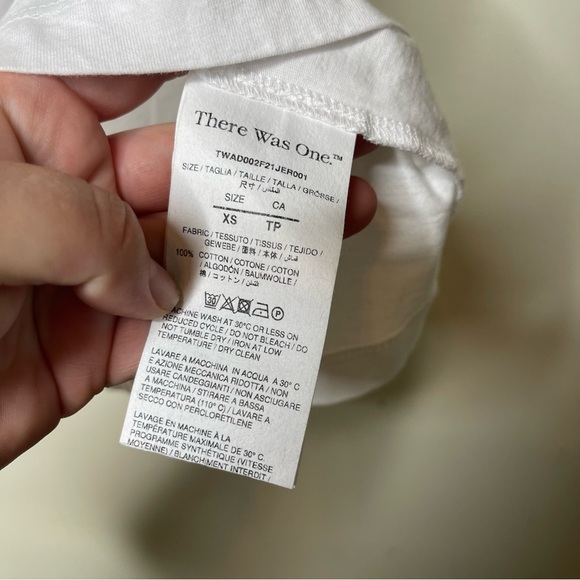 There was one luxury high quality white tank top sz XS - Picture 5 of 7